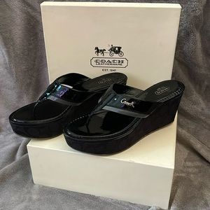 Woman’s Coach platform sandals. 9.5M Jody crinkle patent black leather.